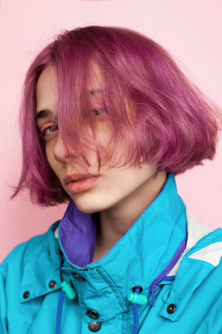 Young woman with purple hair who's a triple Scorpio (same sun, moon, & rising sign).
